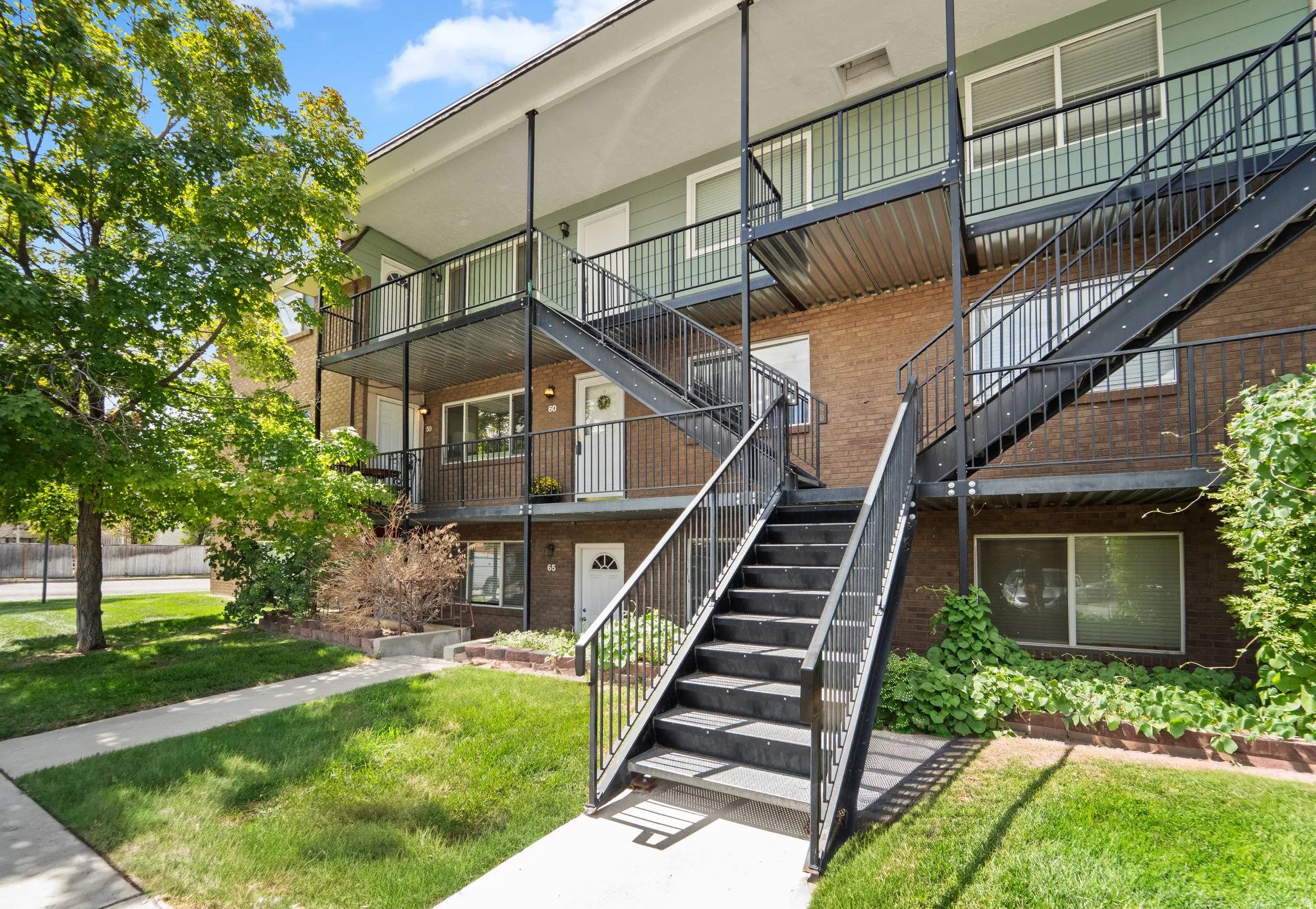 Multi-level building with brick and siding facade