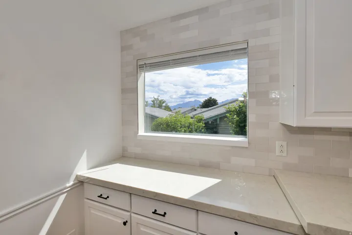 Picture window overlooking Wasatch Mountains