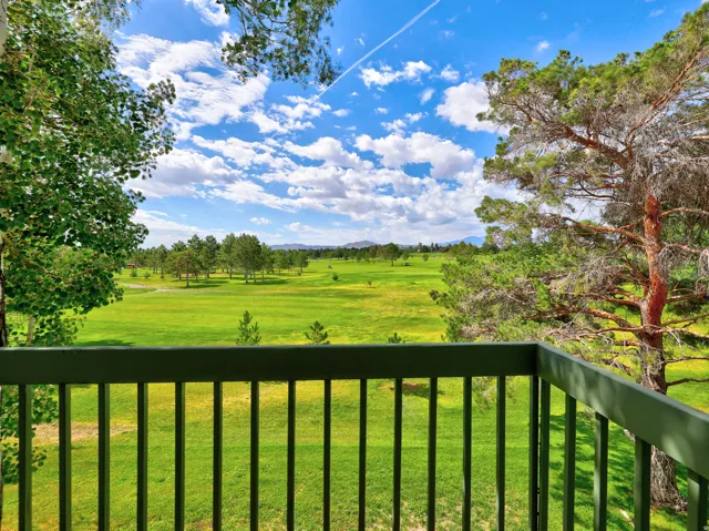 Balcony overlooking beautiful scenery.