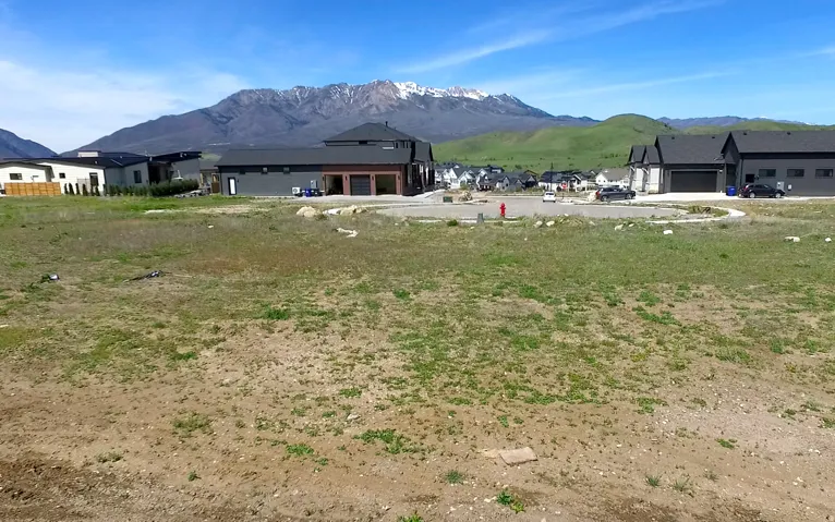 Expansive undeveloped lot with partial mountain scenery
