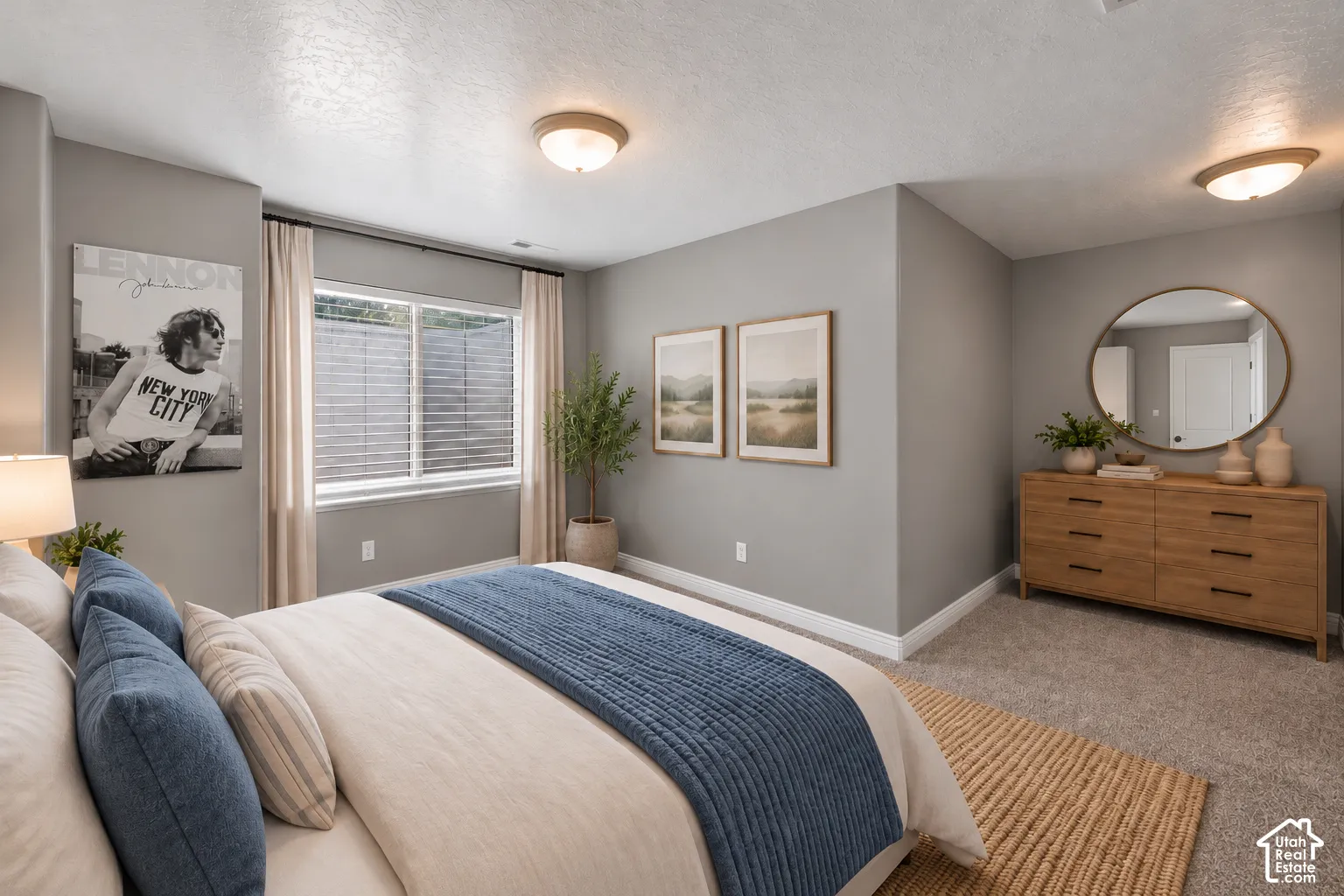Room featuring neutral wall tones, neutral carpeting, and dual flush-mount ceiling lights