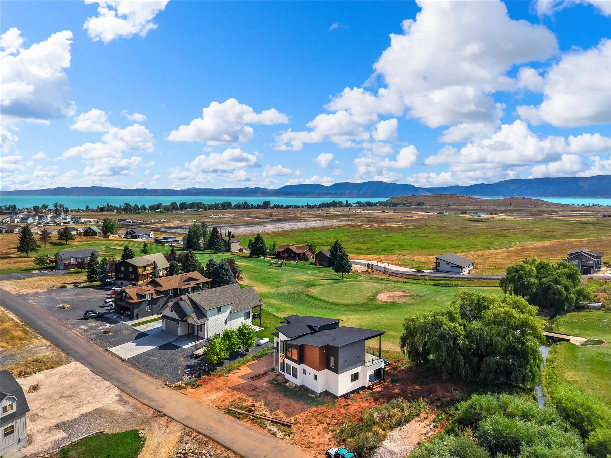 View of the home and the proximity to Bear Lake, neighboring homes and 2nd hole at Bear Lake Golf Course