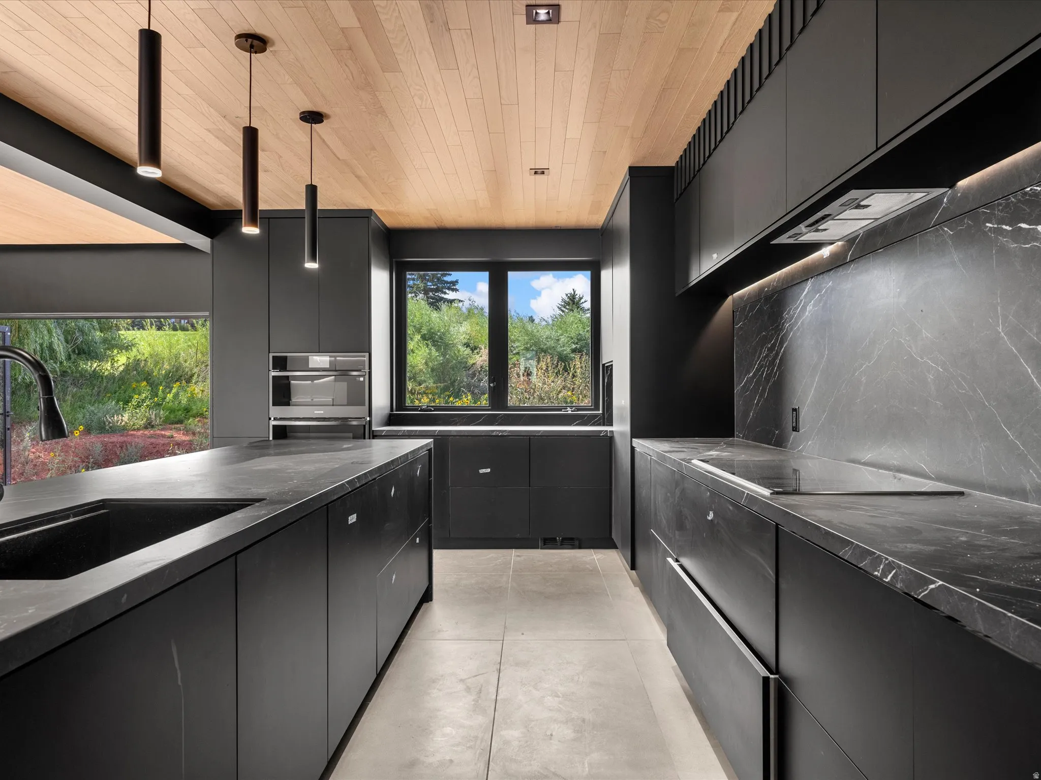 Wood-paneled ceiling with recessed lighting