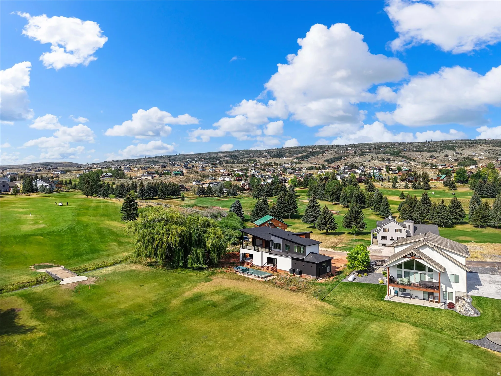 View of the home and the proximity to the 2nd hole at Bear Lake Golf Course