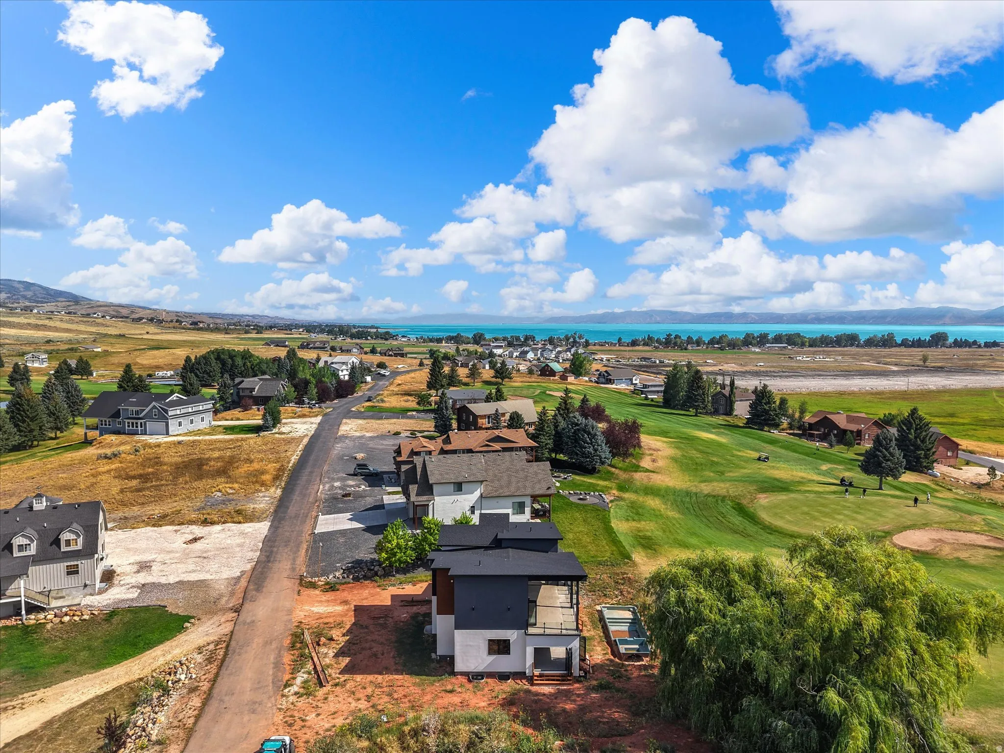View of the home and the proximity to Bear Lake, neighboring homes and 2nd hole at Bear Lake Golf Course