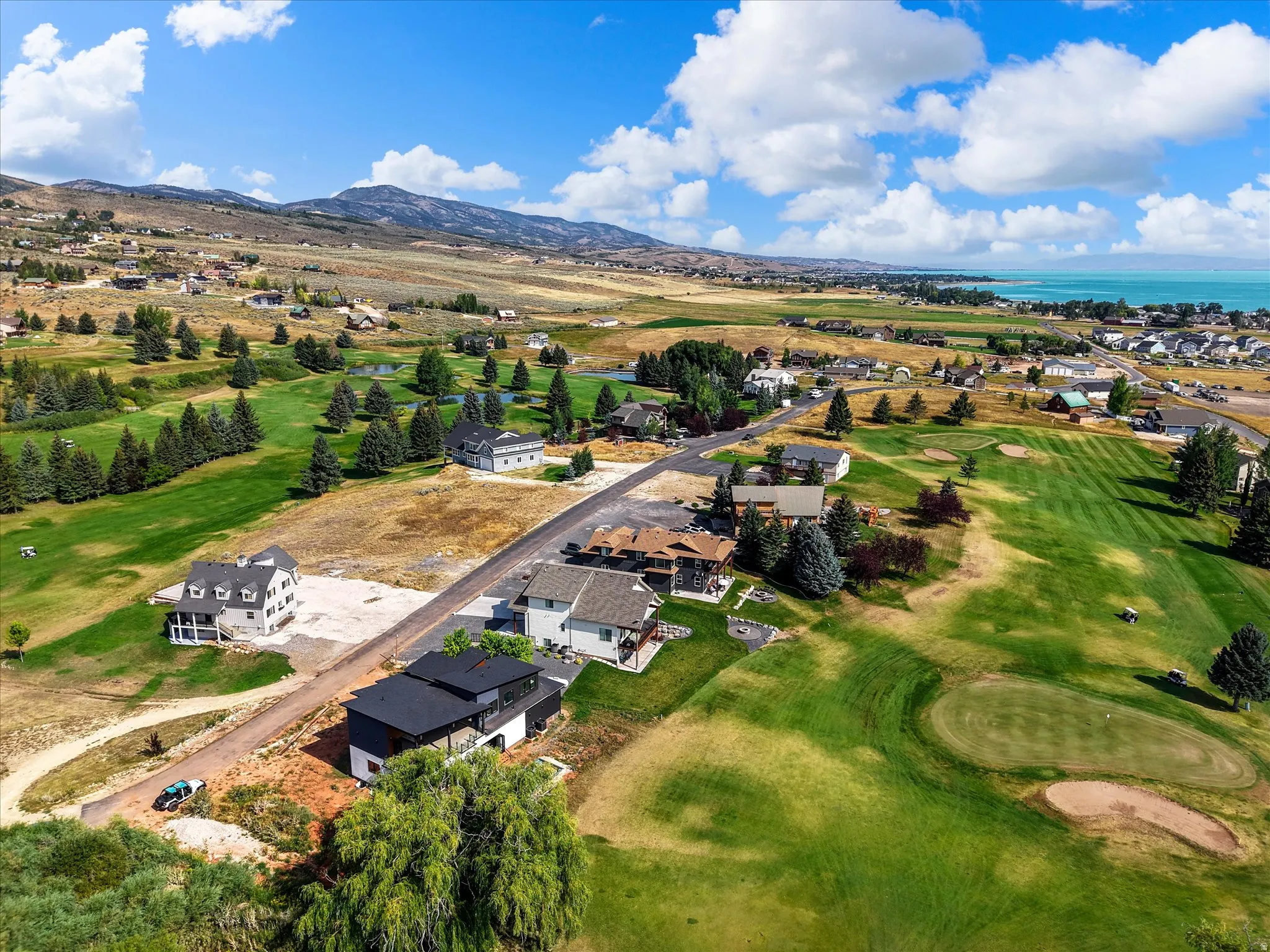 View of the home and the proximity to Bear Lake, neighboring homes and 2nd hole at Bear Lake Golf Course