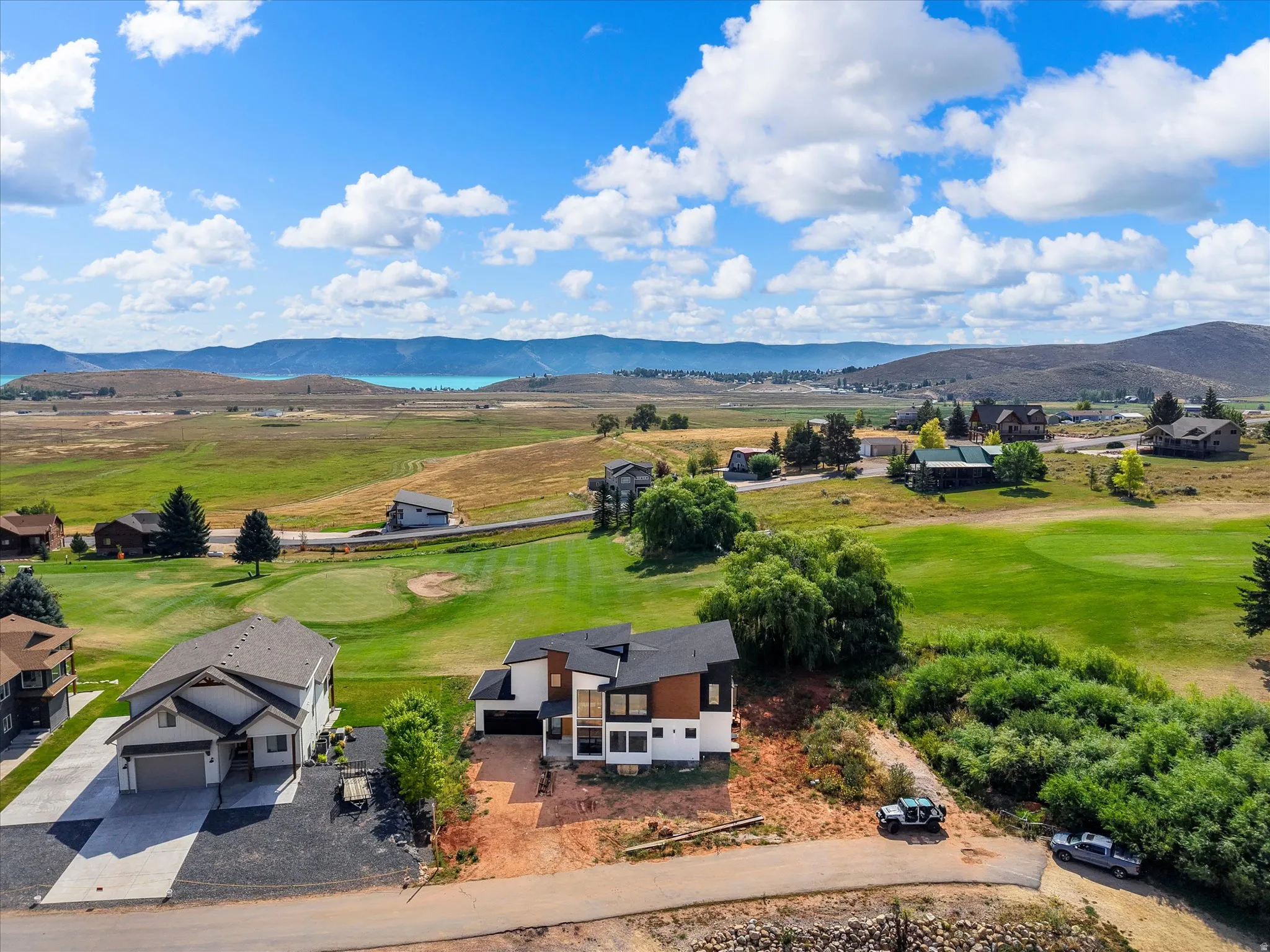 View of the home and the proximity to Bear Lake, neighboring homes and 2nd hole at Bear Lake Golf Course