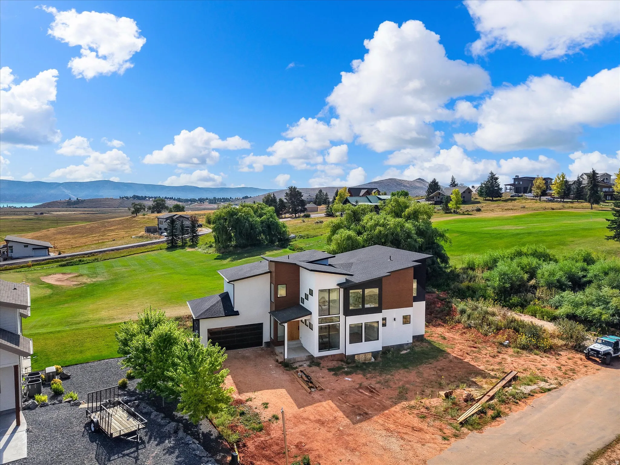 View of the home and the proximity to the 2nd hole at Bear Lake Golf Course