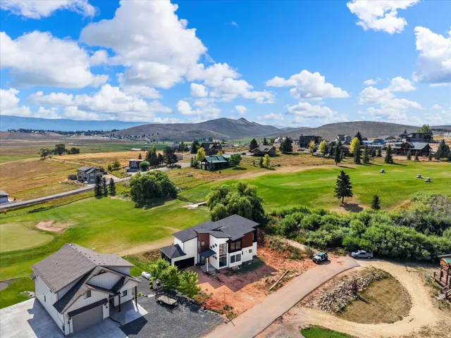 View of the home and the proximity to Bear Lake, neighboring homes and 2nd hole at Bear Lake Golf Course