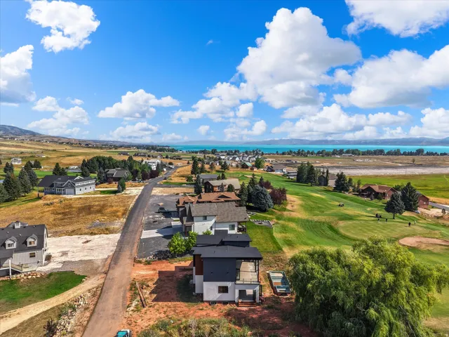 View of the home and the proximity to Bear Lake, neighboring homes and 2nd hole at Bear Lake Golf Course