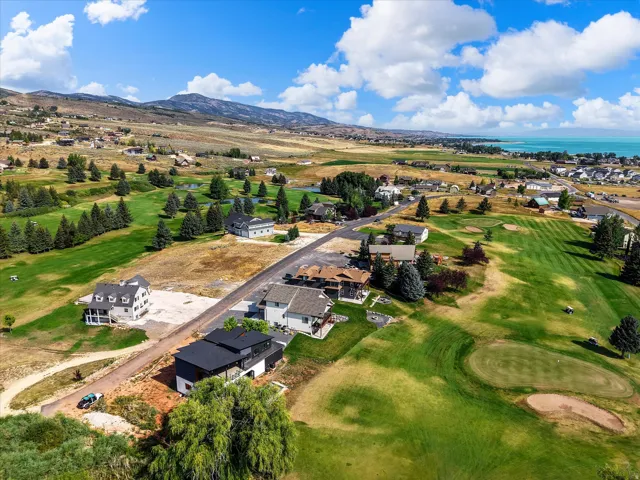 View of the home and the proximity to Bear Lake, neighboring homes and 2nd hole at Bear Lake Golf Course