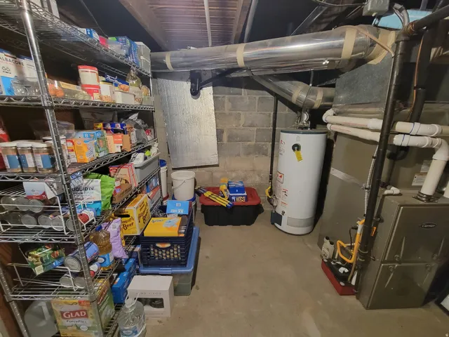 Mechanical Room with storage and crawl space