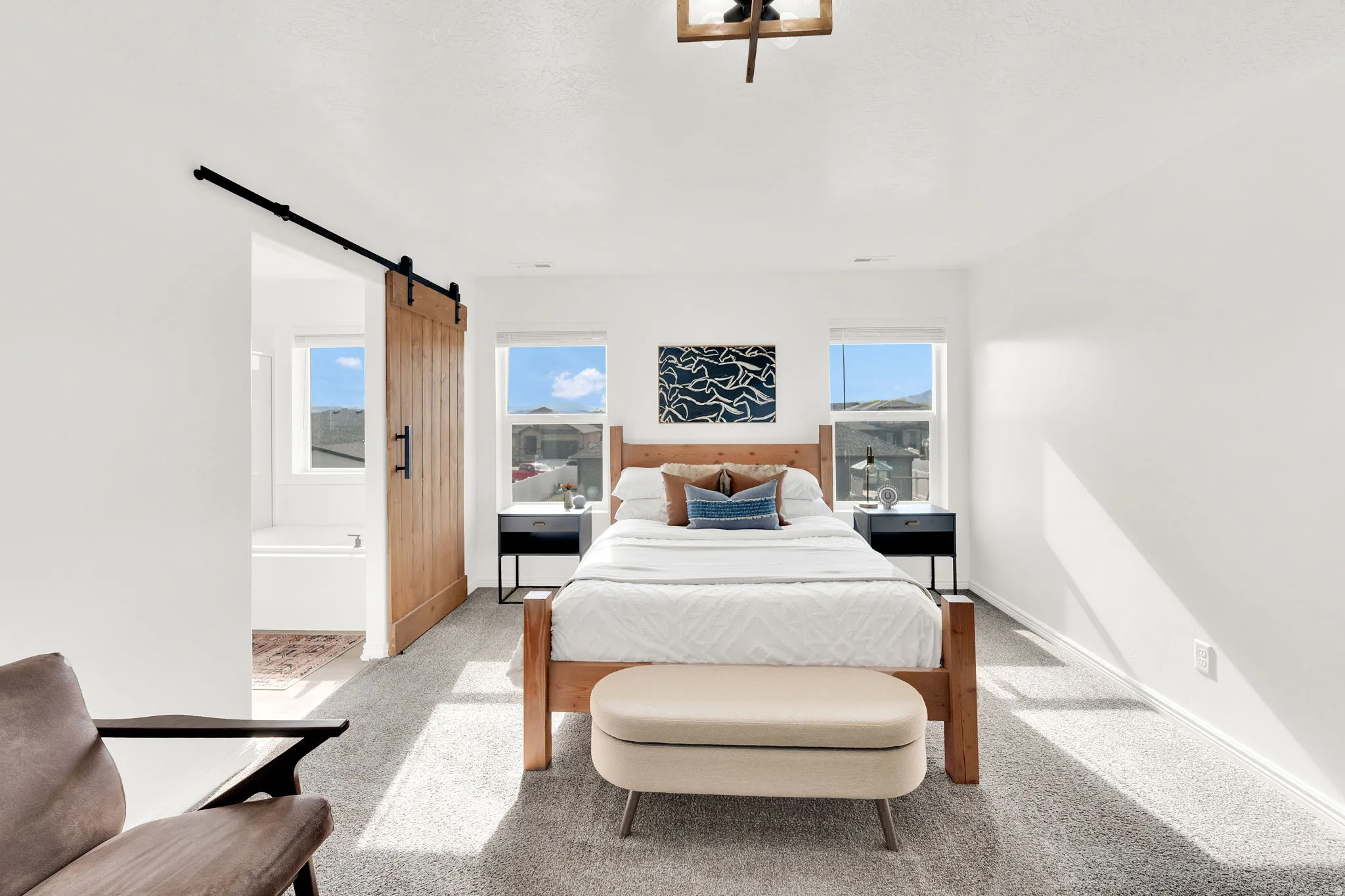 Your new primary suite is able to accommodate your bedroom set while providing gorgeous views