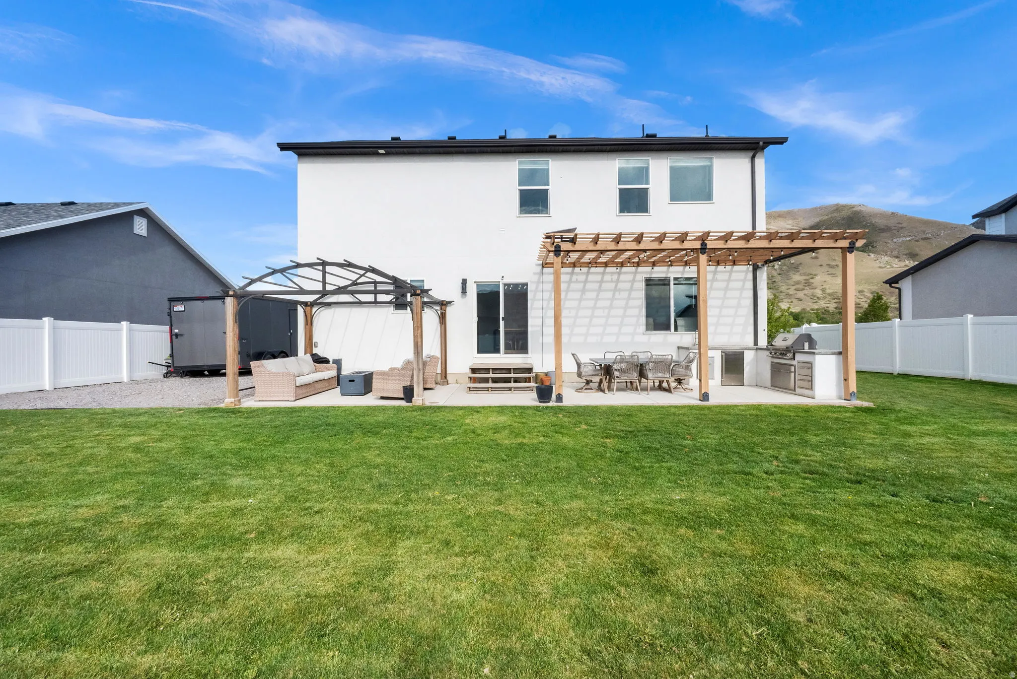 2 pergola provide outdoor entertainment spaces