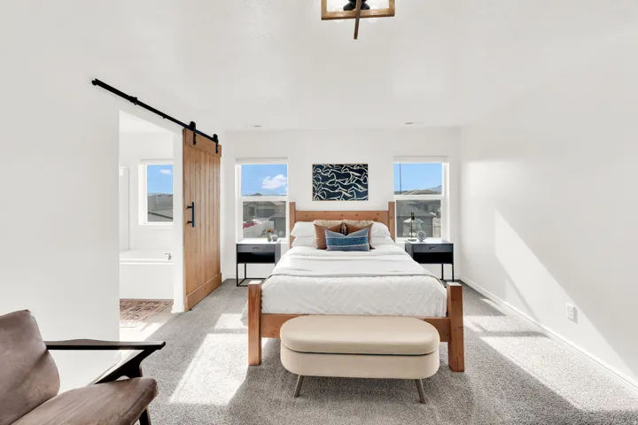 Your new primary suite is able to accommodate your bedroom set while providing gorgeous views