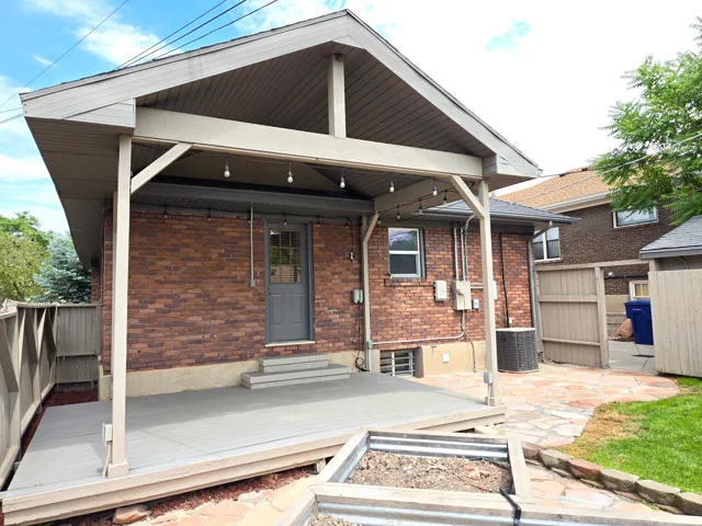 Covered patio with composite decking and integrated lighting