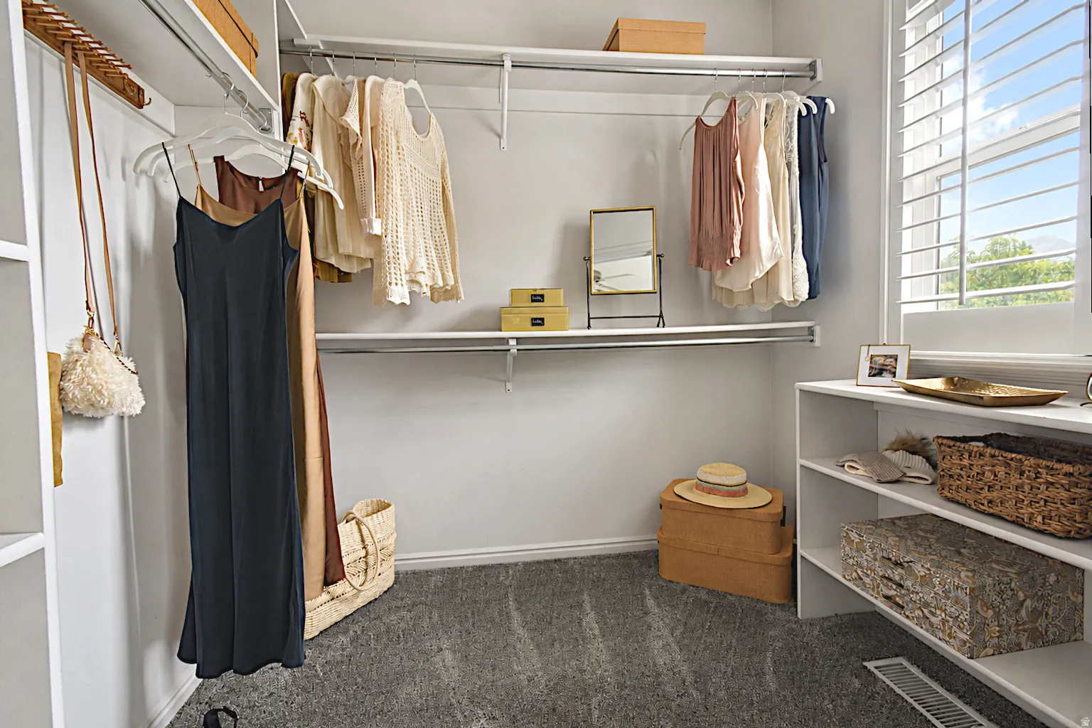 Built-in closet organization system featuring shelving and hanging rods