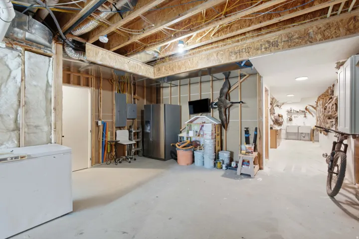 Large unfinished owner's private portion of the basement