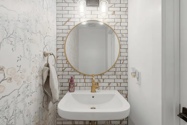 Guest bathroom off the garage space/mudroom area