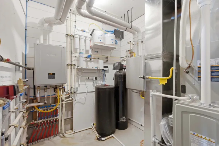 2 furnaces, 2 A/C units, boiler combi system that is highly efficient and heats home including on demand tankless water heater