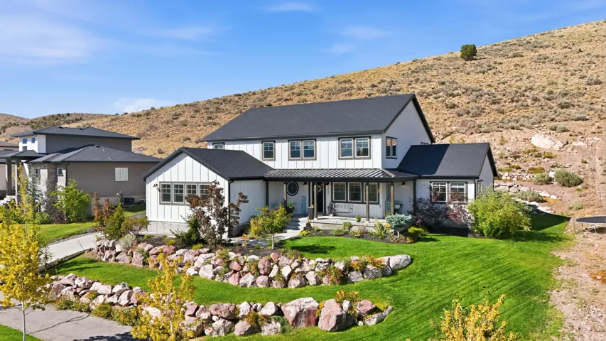 Beautiful custom estate positioned on an elevated view lot offering sweeping scenery and privacy.