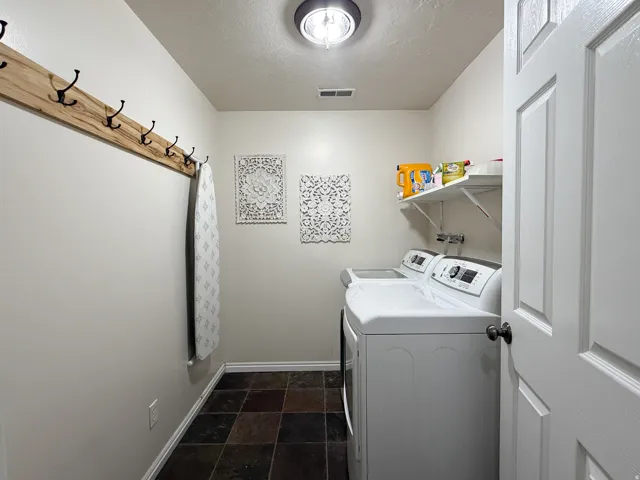 In unit laundry located in the basement by the bedrooms.