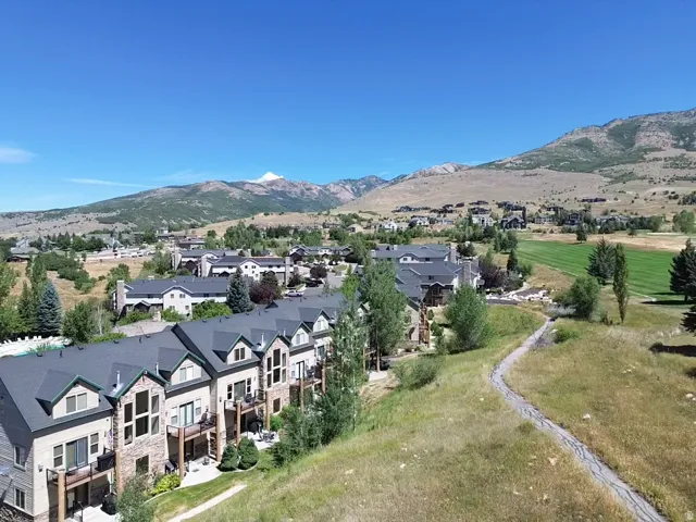 Beautiful and well-planned Moose Hollow Condo Community packed with ammenities and stunning views of the mountains and valley: pool, 2 year roud spas, sauna, exercise room, game room, clubhouse, pickleball, disc golf, Wolf Creek Golf Course, hiking and bi