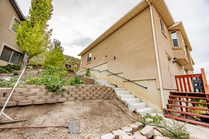Exterior stucco finish with multiple windows