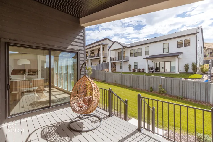Spacious deck with dark railing and composite decking