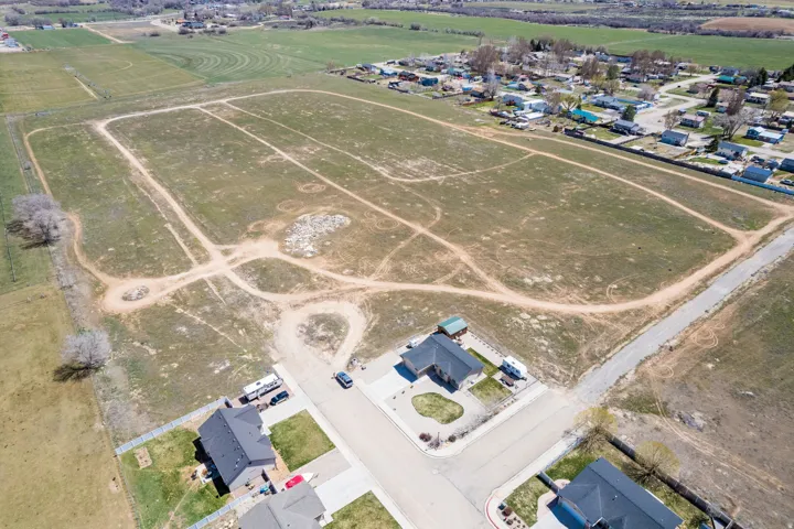 Expansive undeveloped parcel featuring established dirt pathways
