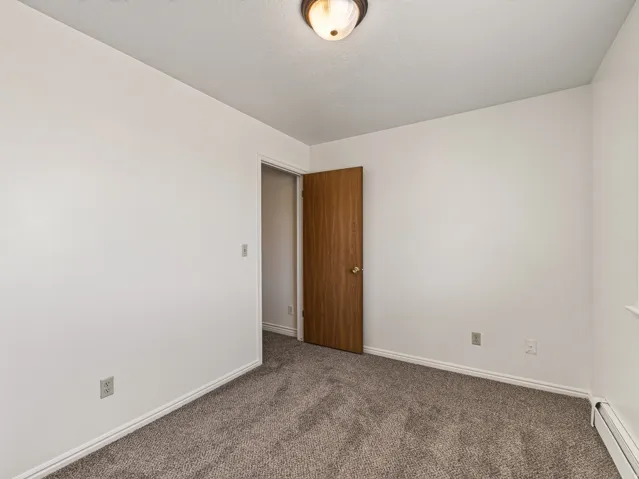 Neutral wall colors with textured carpeting