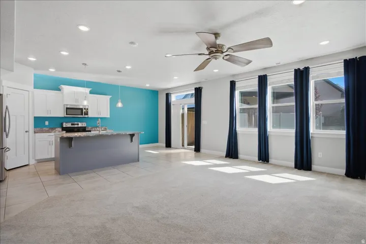 Open-concept living area with integrated kitchen