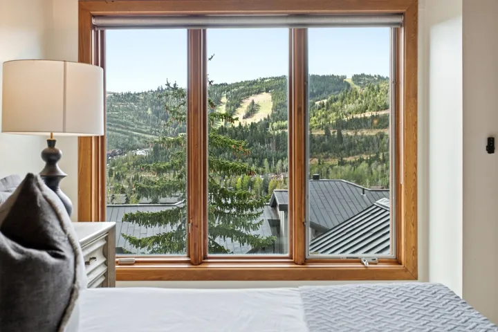 Large picture window with wood trim