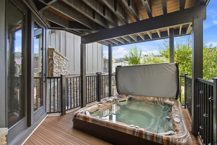 Outdoor hot tub on a composite decking surface