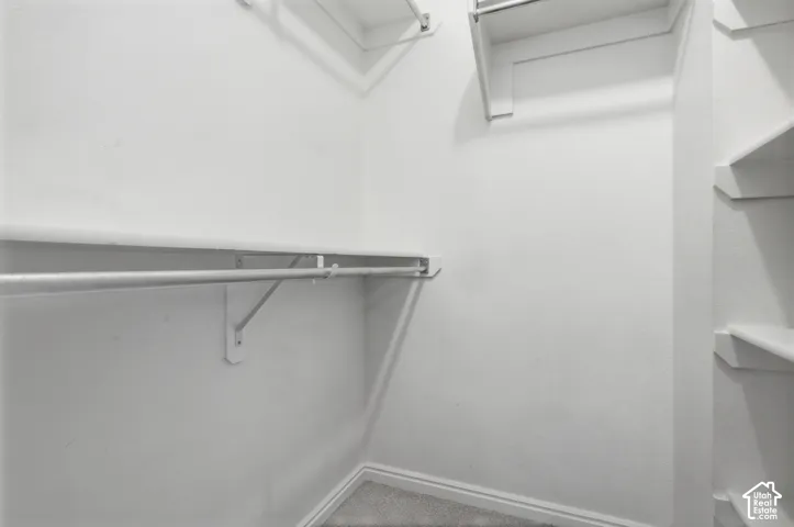 Built-in shelving and hanging rods for organized storage