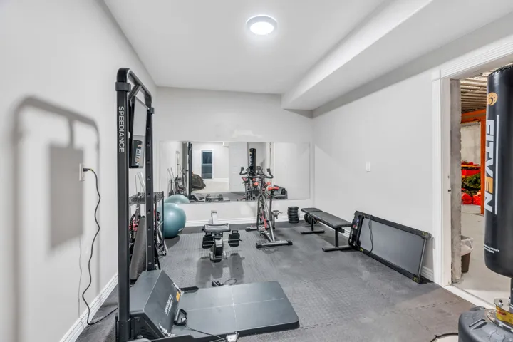 Recessed lighting, wall-mounted mirrors, and resilient flooring