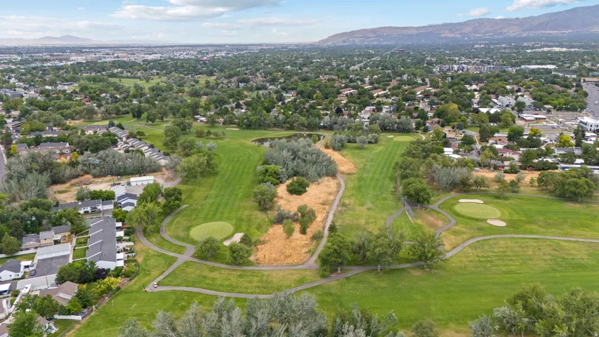 Lush golf course grounds with manicured greens and fairways
