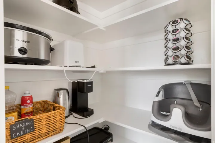White built-in shelving with ample depth