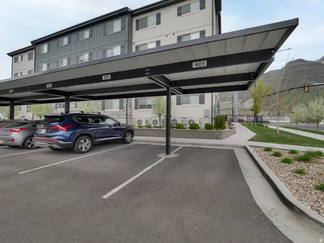 Covered parking structures with designated spaces