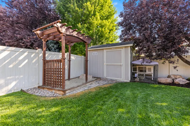 Sandbox with pergola, and coordinating storage shed