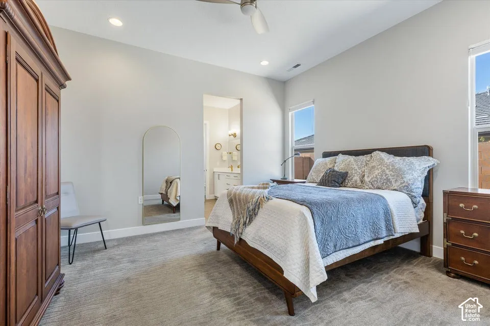 Recessed lighting, sloped ceiling, and multiple windows
