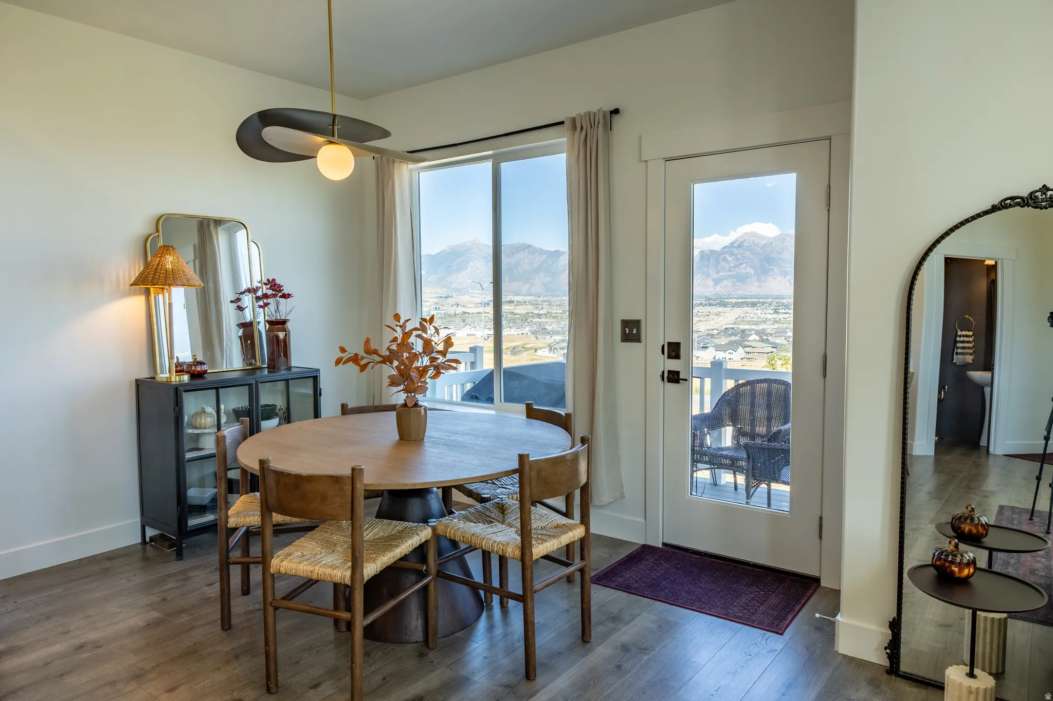 Large windows with mountain and city scenery