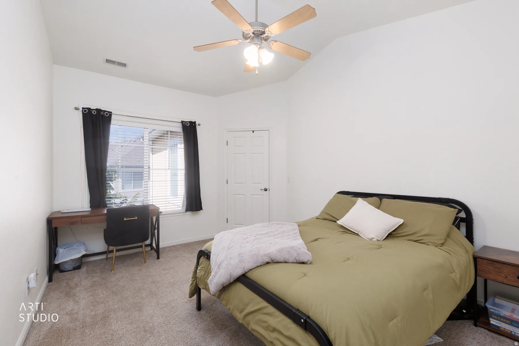Vaulted ceiling with a ceiling fan, window with blinds, and neutral carpet flooring