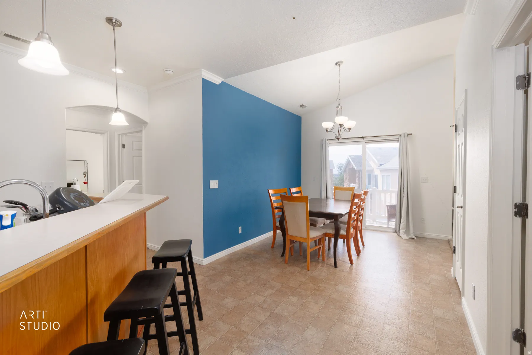 Kitchen pass-through with wood-finish paneling