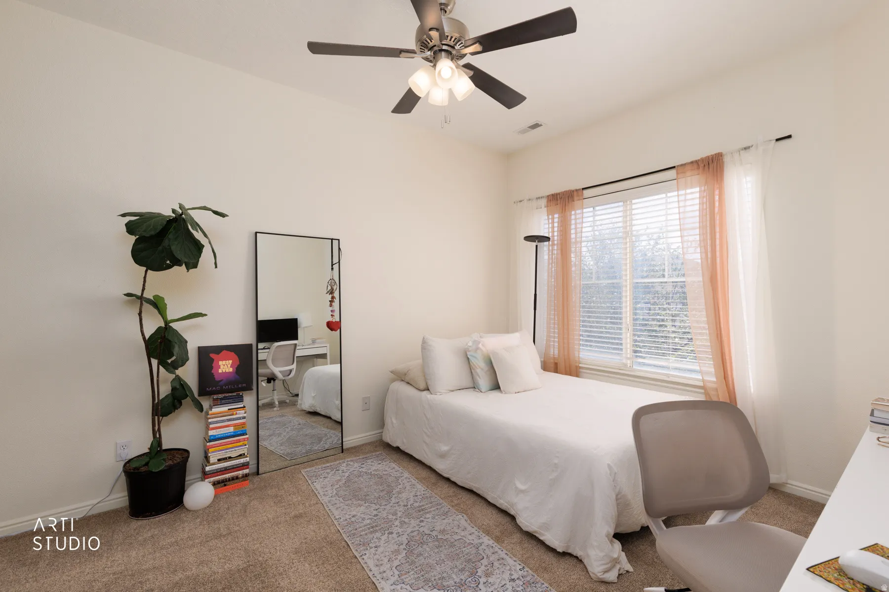 Carpeted flooring, ceiling fan with integrated lighting, window with blinds, and white walls