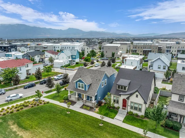 Expansive green space and mountain backdrop