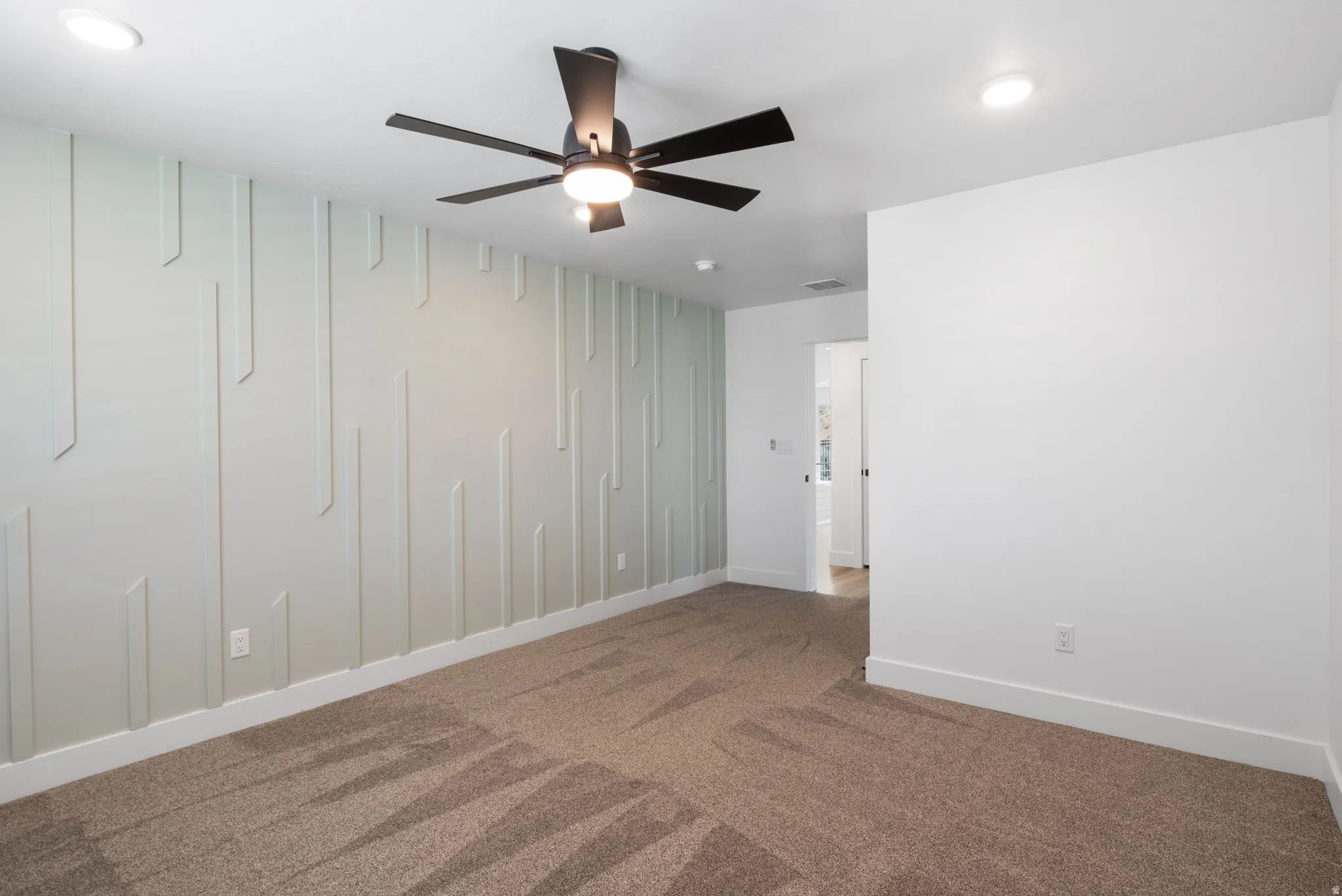 Accent wall with geometric paneling