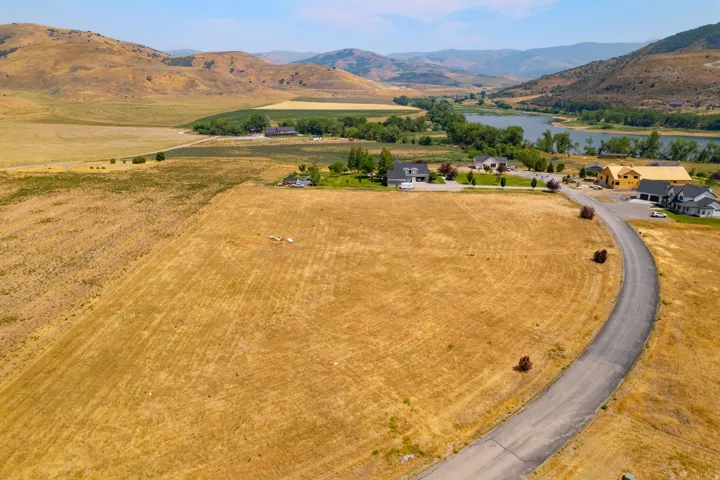 Expansive undeveloped land featuring a paved road