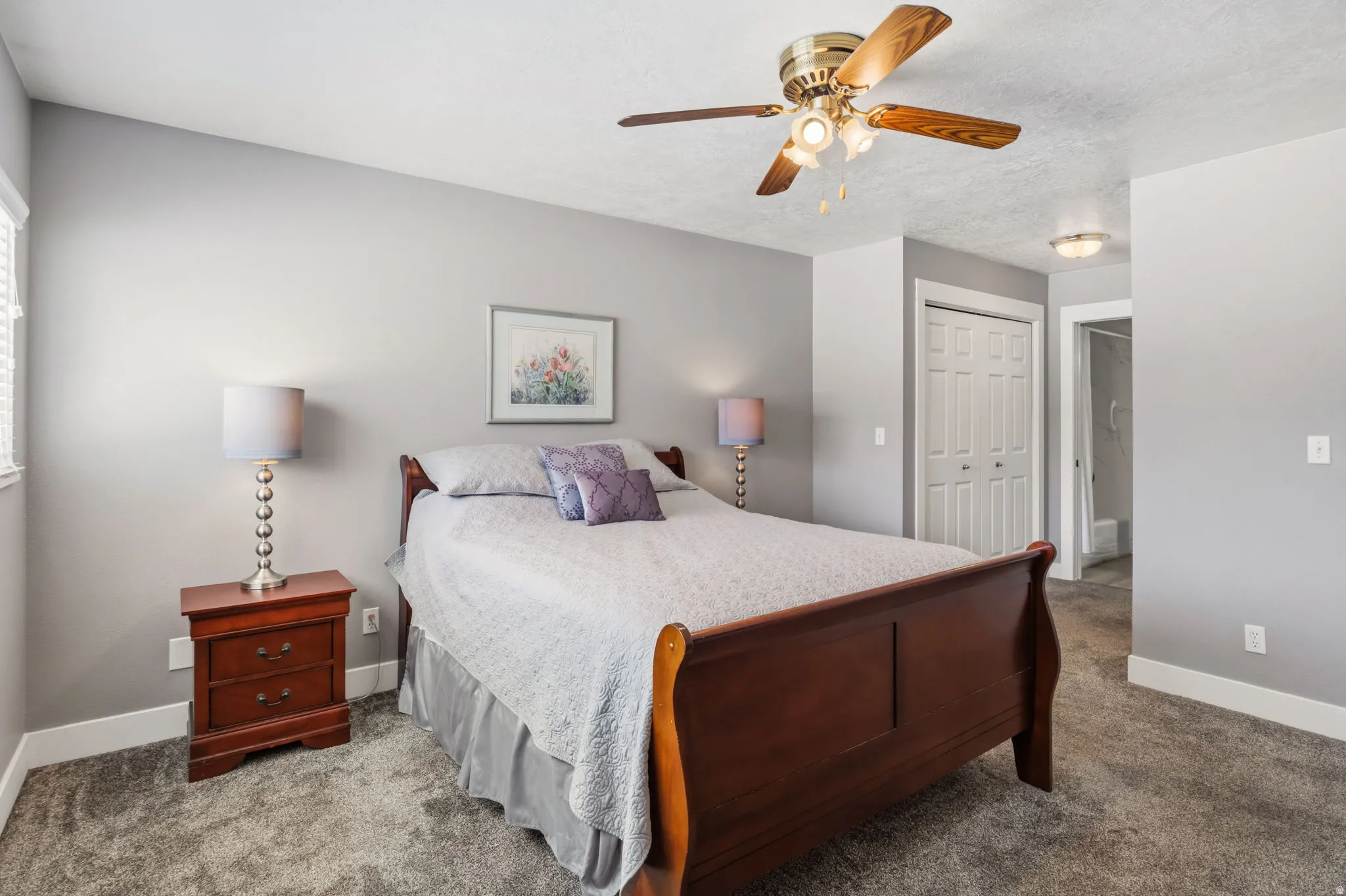 Primary Bedroom with double closets on both sides of hallway