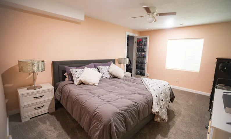 Recessed lighting, ceiling fan, and carpeted flooring